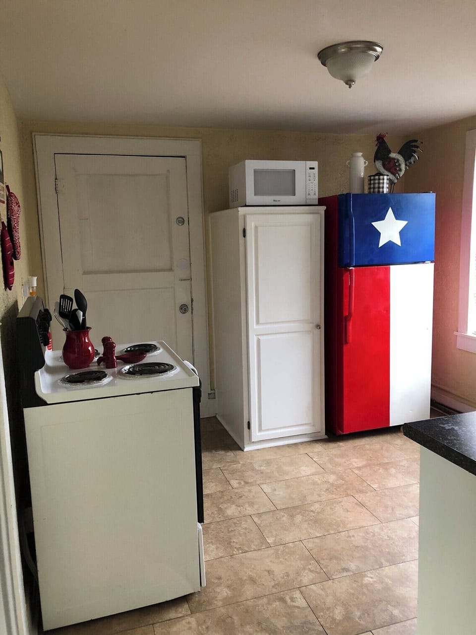 Kitchen with door to laundry room