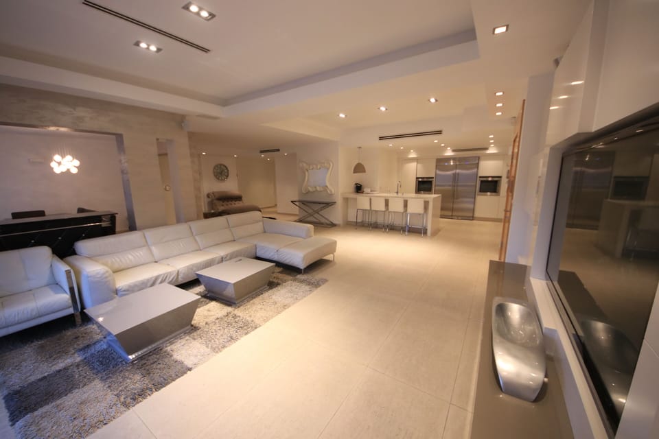 60 inch screen and a Bose Home Cinema System