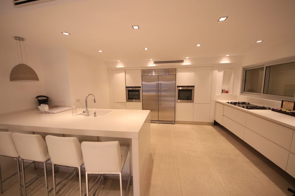 2 Ovens, Fridge, Freezer, gas and electric stove plates