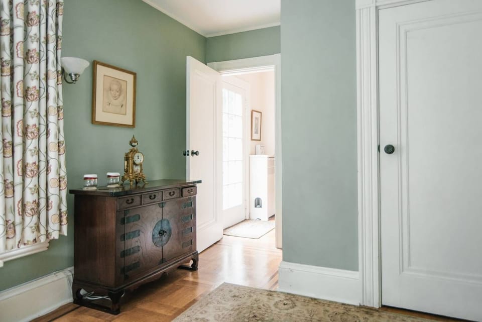 Door to small room and private porch overlooking the gardens
