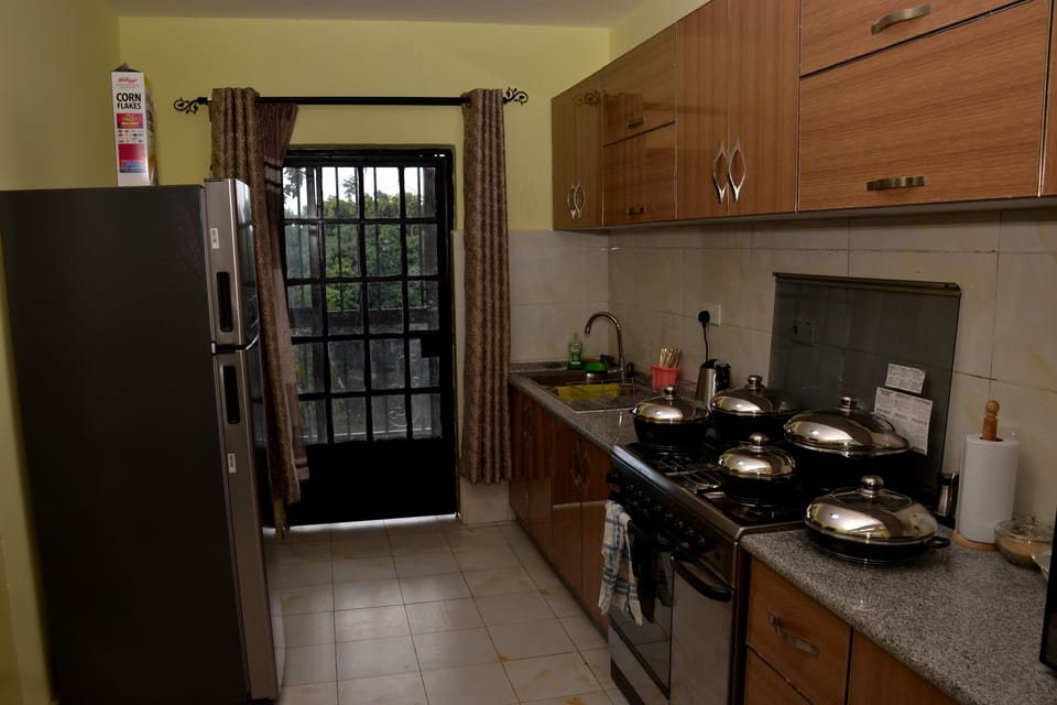 Kitchen with balcony area