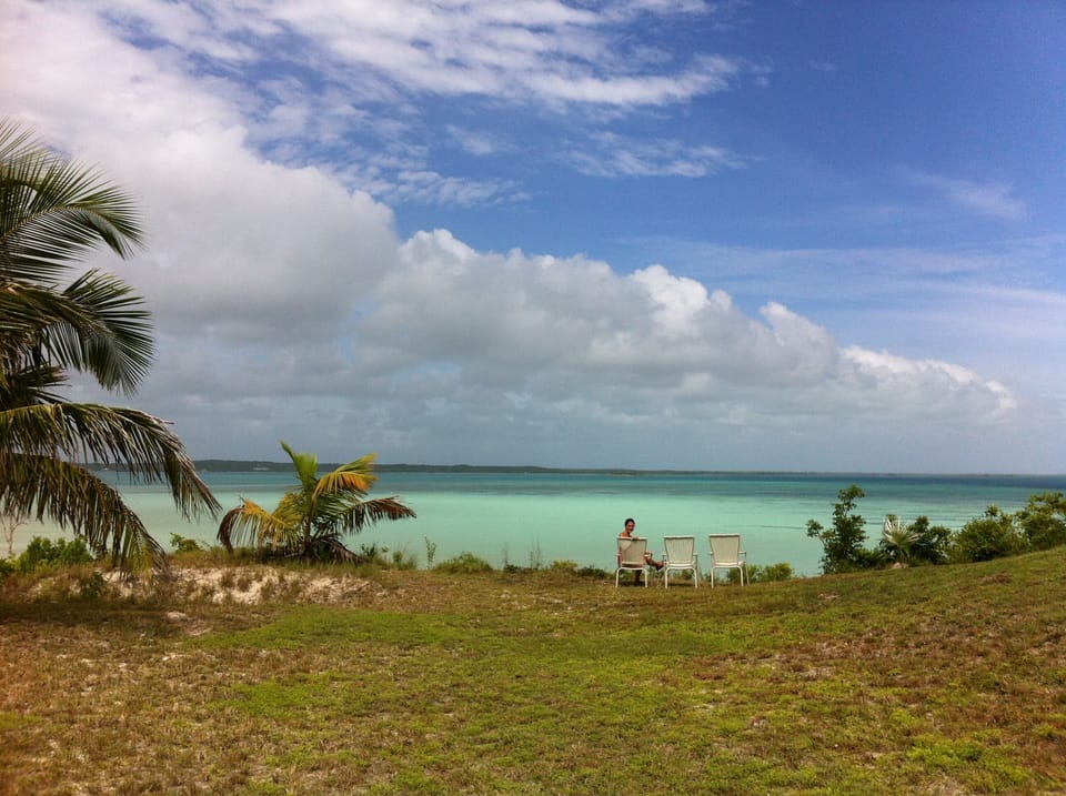Take a chair to the edge of the Bluff for stunning bay and sunset views