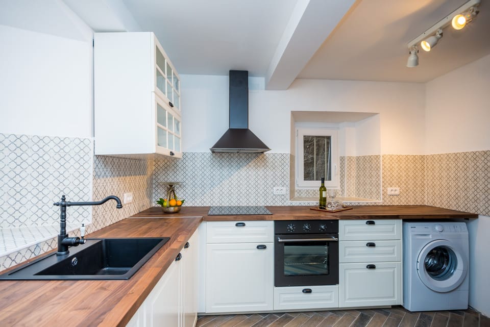 Fully equipped Kitchen, cooker, oven , the dishwashing machine, refrigerator,