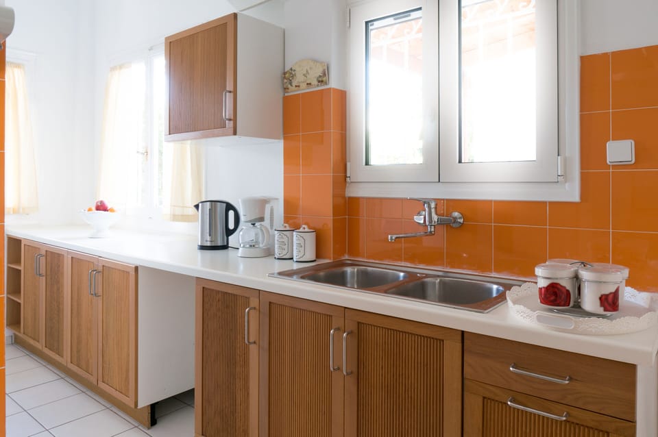 The well-stocked kitchen with lots of natural light 