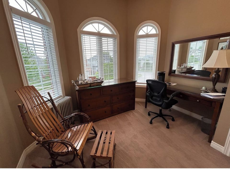 Dresser, desk and rocking chair in the Queen Suite