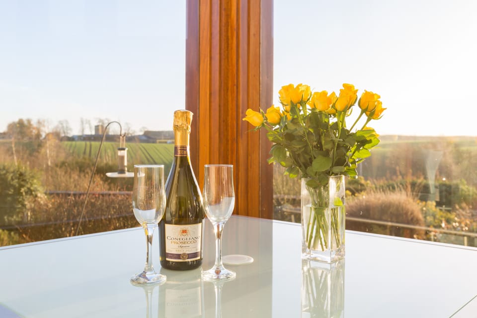 Relax in your south facing conservatory. Admire the wonderful view. 