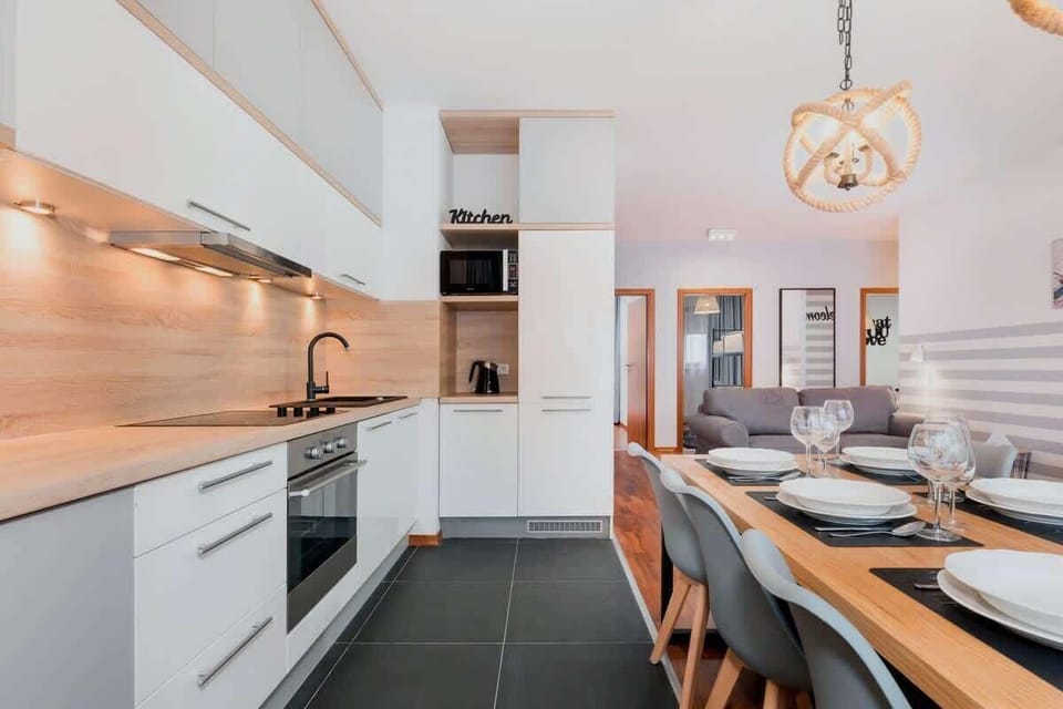 The kitchenette creates the perfect space for cooking home-cooked meals.