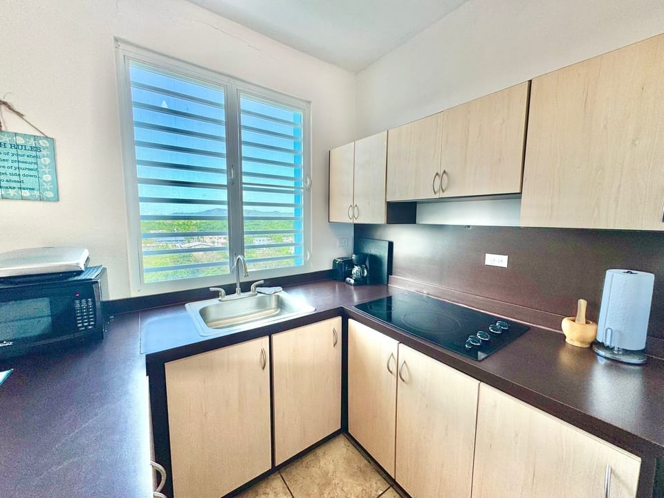 kitchen- fully equipped w utensils & pots/pans. Mr Coffee drip maker.