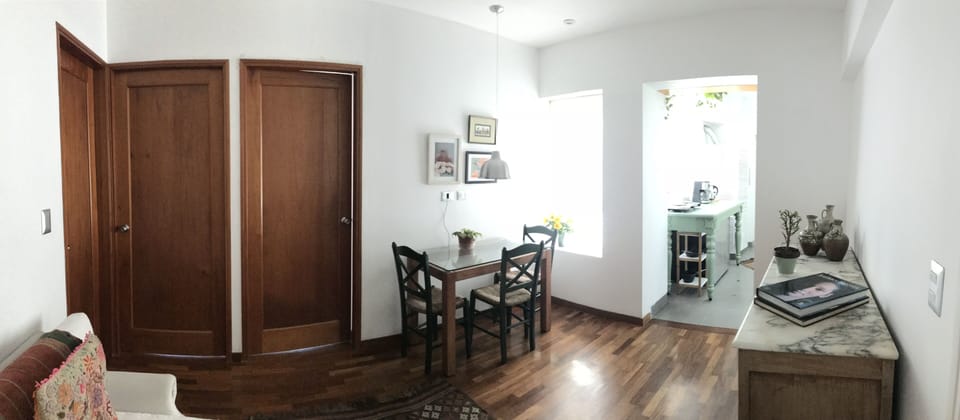 Panoramic dining, siting room and kitchen