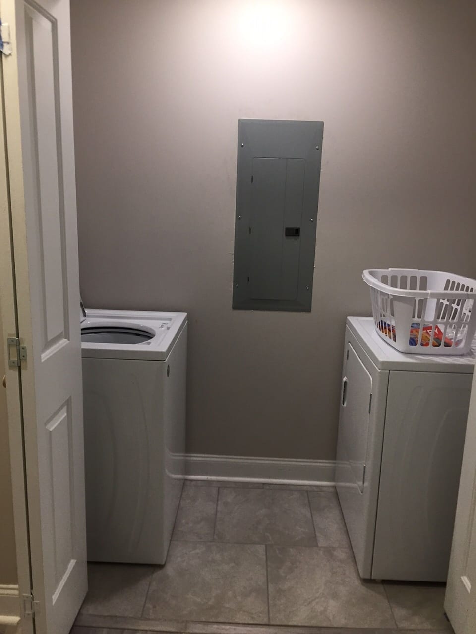 Laundry room with full size washer and dryer