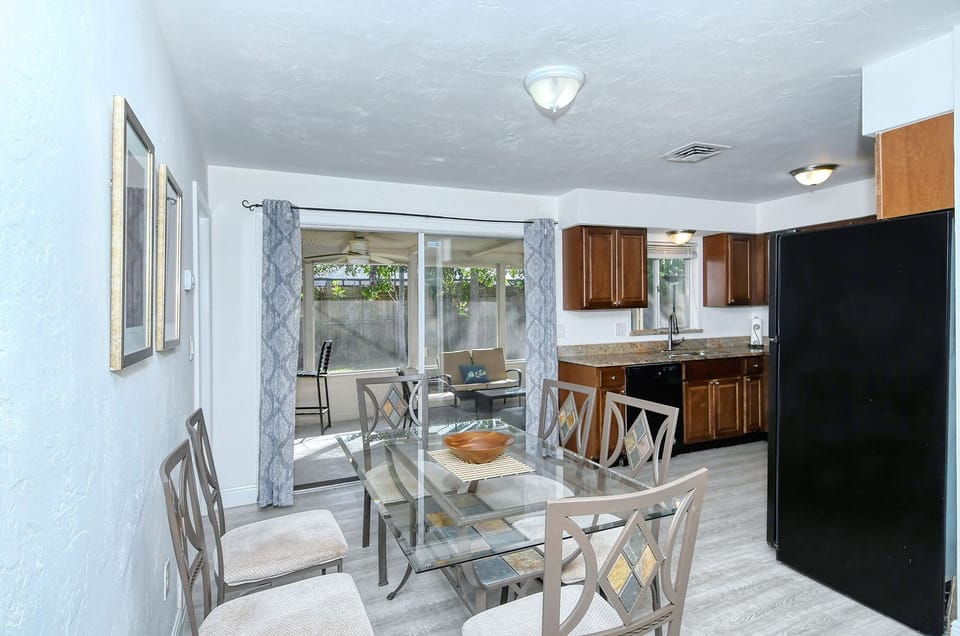 Dining area with easy access to the kitchen and lanai.