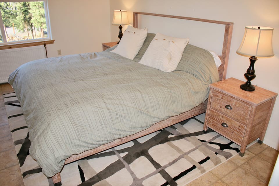 king size bed in bedroom 1