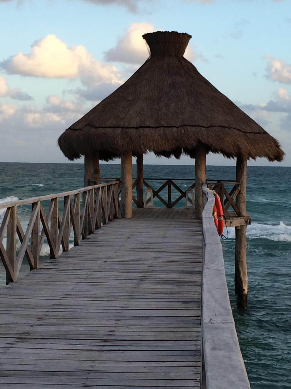 Hut at the end of pier with ocean view