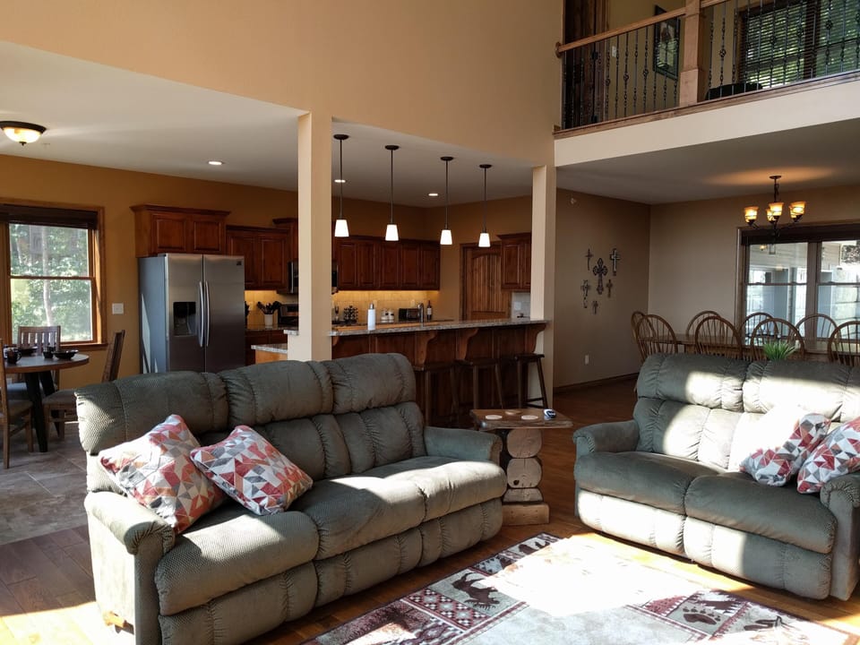 Great Room, Kitchen area and partial view of Dining Room