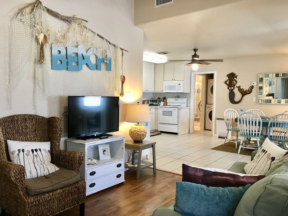 Living room looking into kitchen/dining 