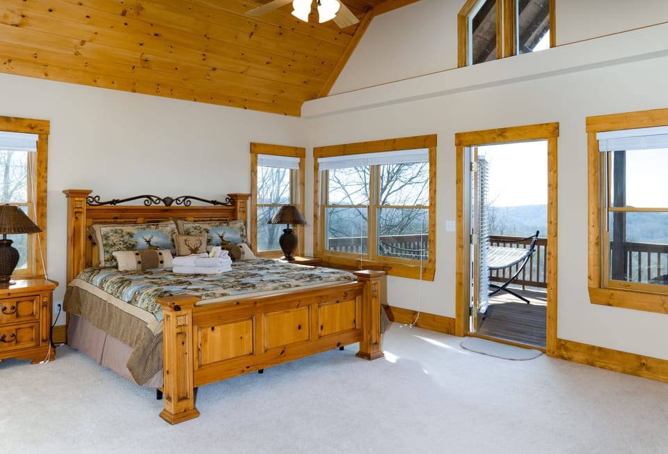 Upstairs King Master with gas fireplace, private balcony, ensuite and Smart HDTV