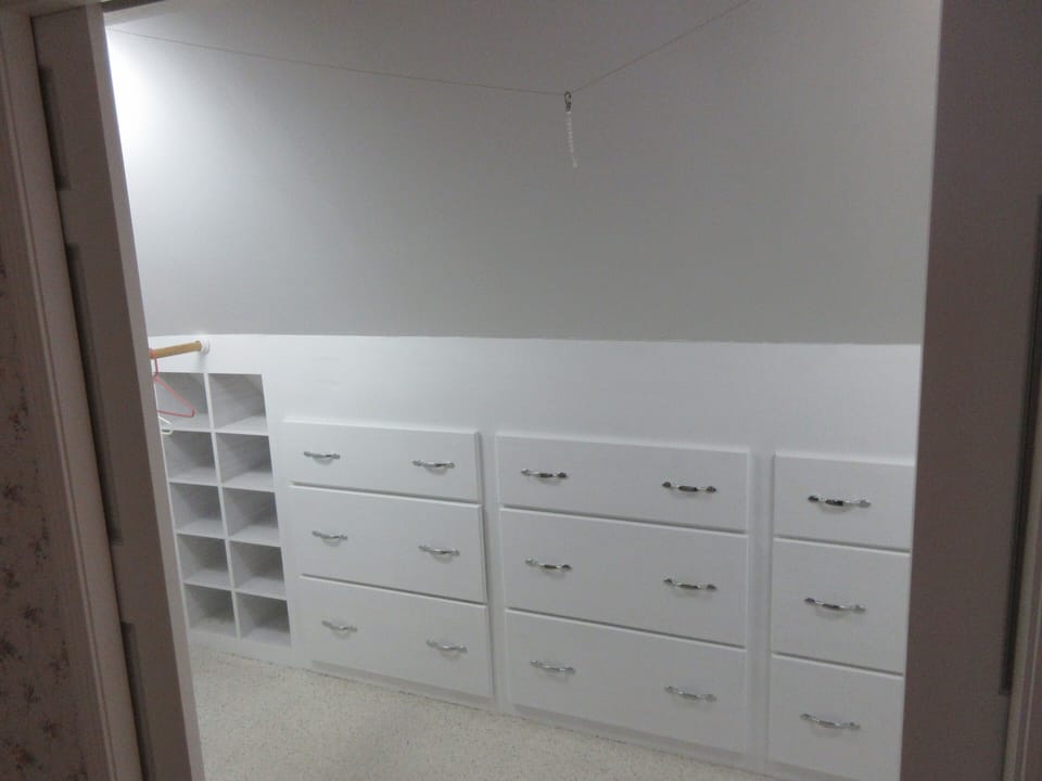 Walk-in closet off master bedroom