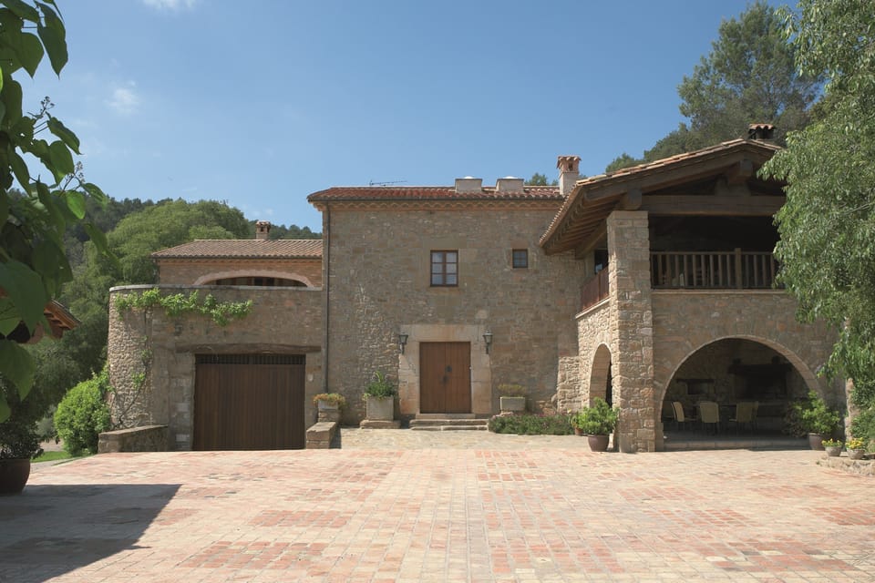 Left door = 120m2 playroom, center door =  main entrance, archway barbecue area
