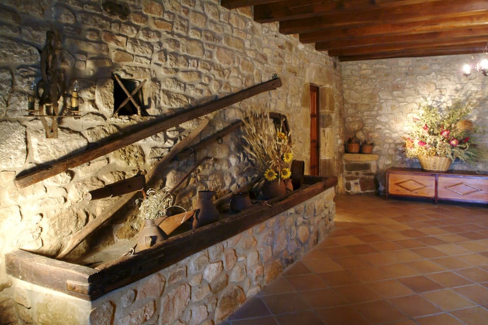 The main entrance is all old stonework and farm implements and very atmospheric!