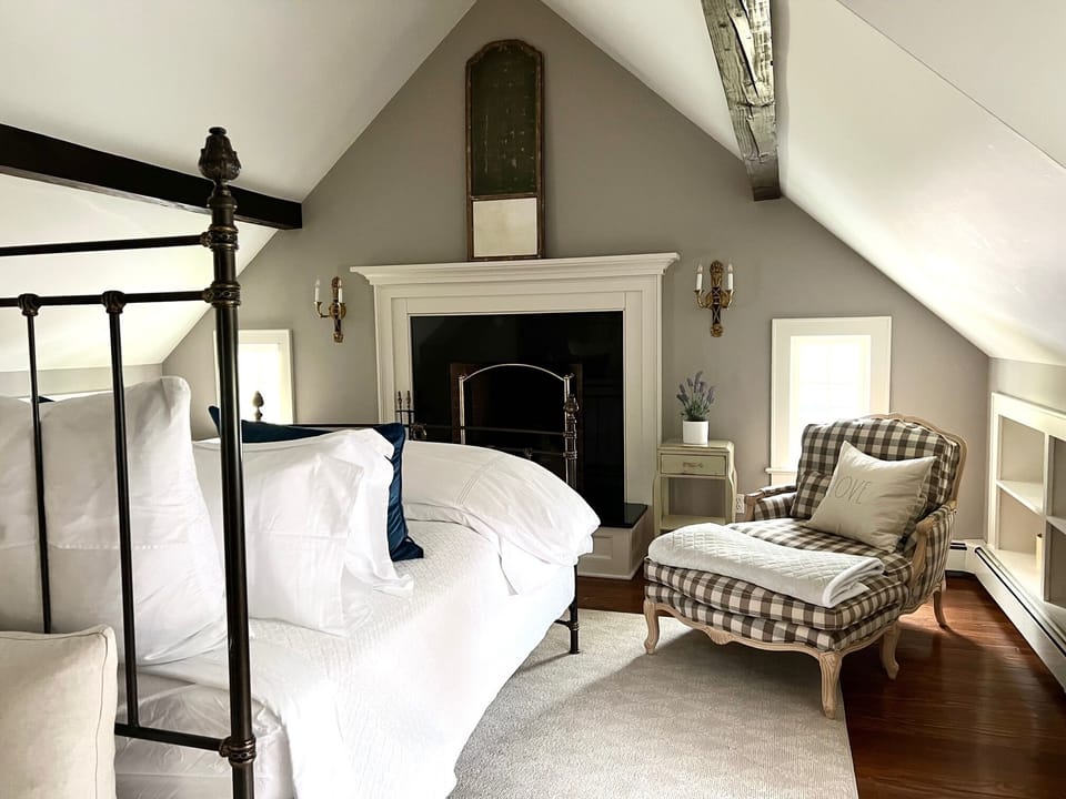 Bedroom suite 1 with decorative fireplace