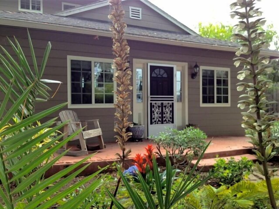 Front of the house.  Ramped.  Perfect for reading.  Southern exposure.