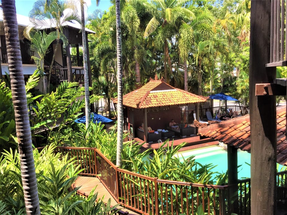 The outlook from the balcony overlooking the lagoon style pool.
