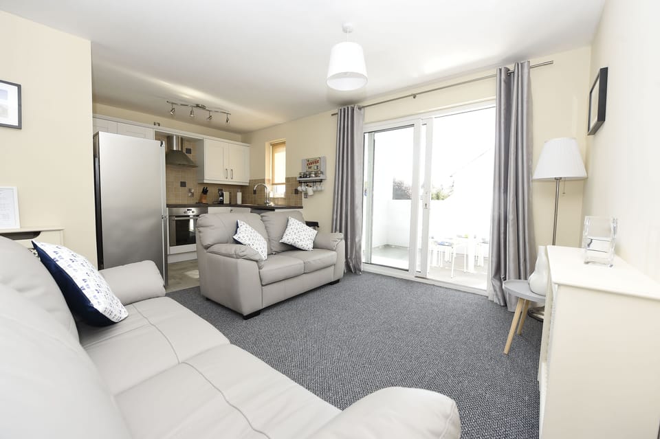 The living area leads to the south facing balcony.