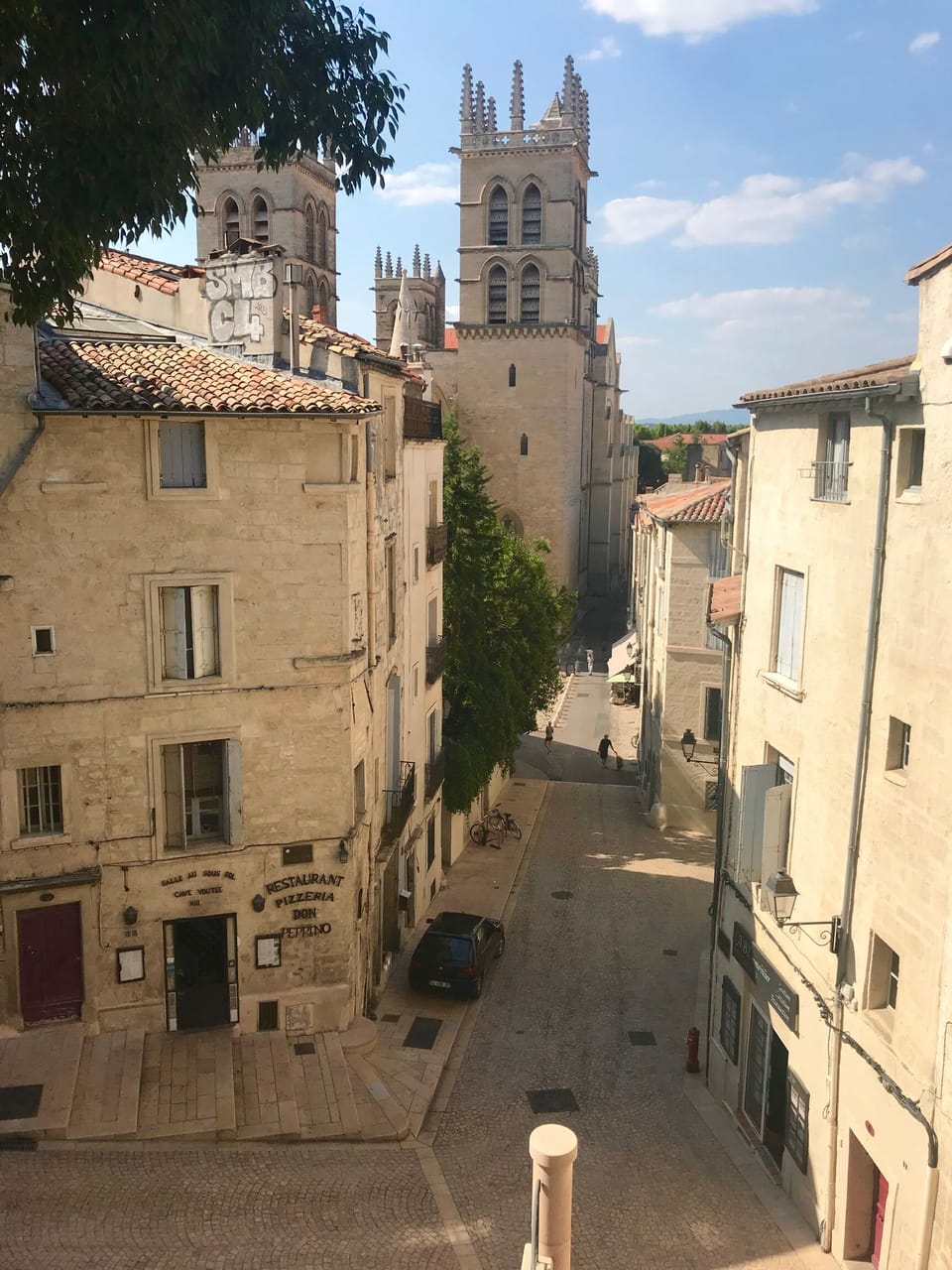 Rue St Pierre from place de la Canourgue