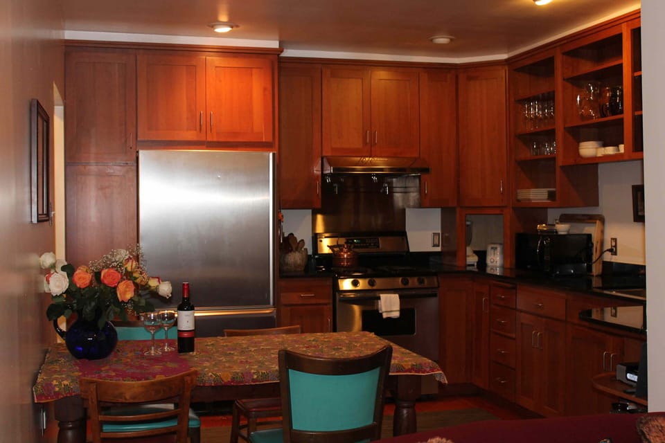 Kitchen with Cherry Cabinets and granite countertops.  Well equipped and comfy!