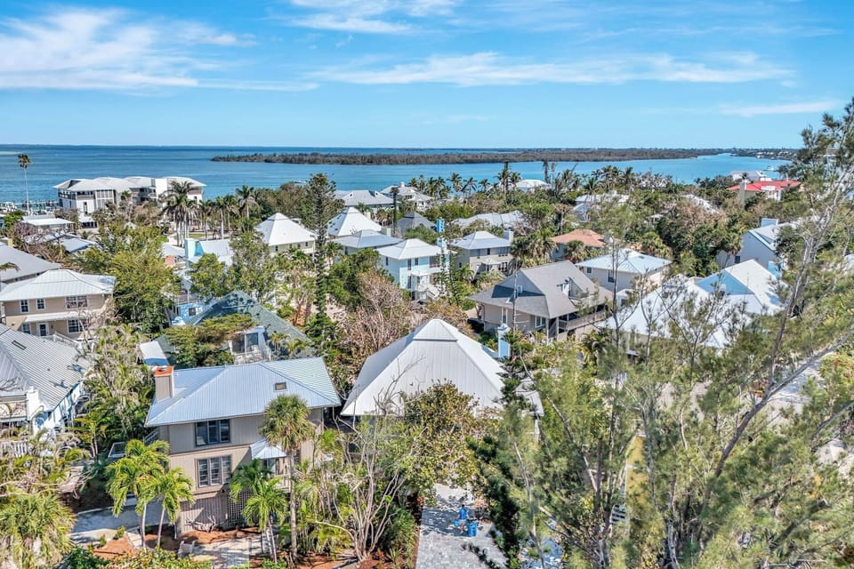 Aerial view of Journey's End with White roof and Blue Chimney