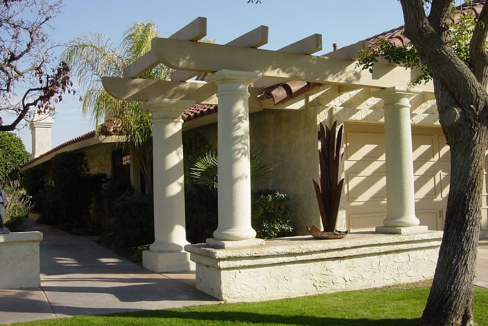 The garage has floor to ceiling cabinets with special spots for golf bags.
