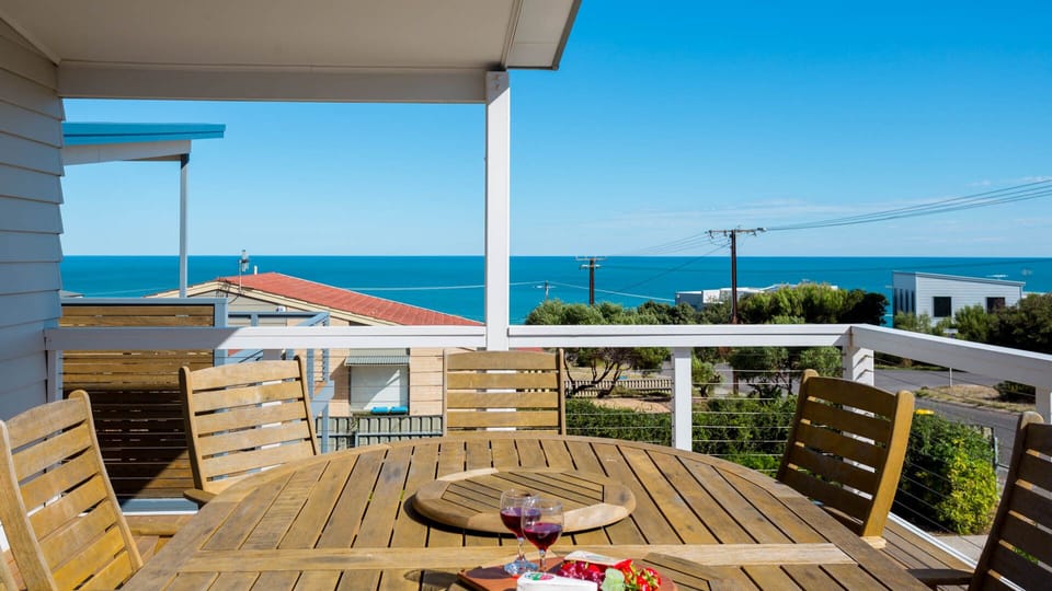 Relaxing on front balcony with stunning views of Boomer Beach