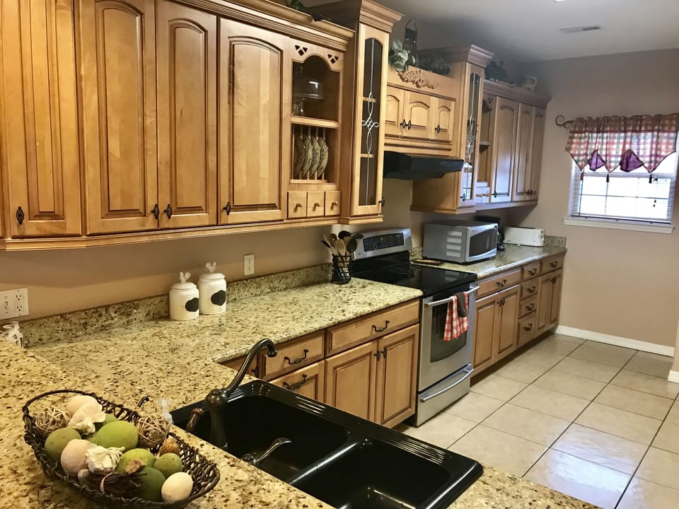 Kraftmaid kitchen with all appliances, electric griddle, crock pot, blender. 