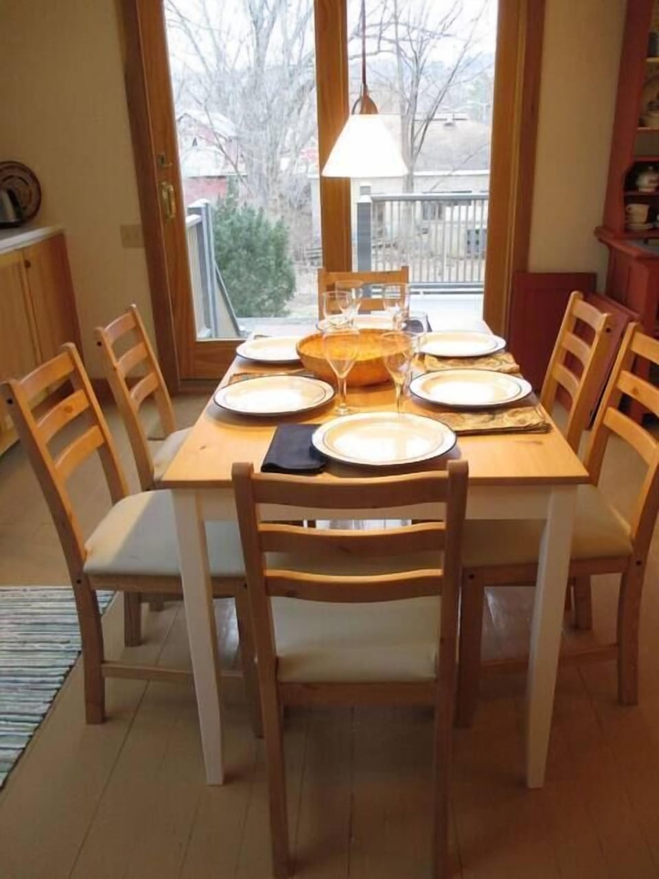 Dining for up to eight overlooking the deck and back yard