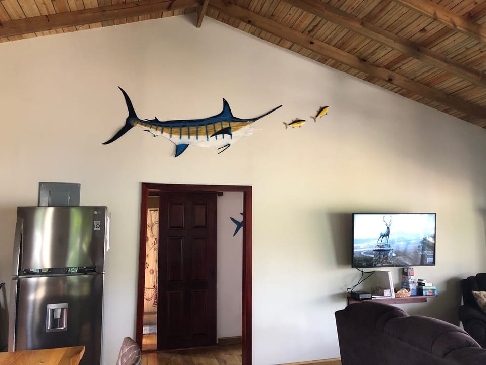Wide open floor plan with high natural ceilings with ocean views from everywhere