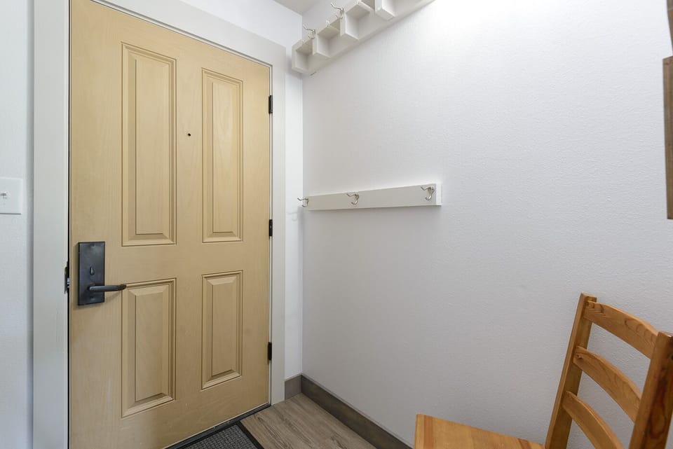ROom for skis, snow boards and ski coats in the entry.