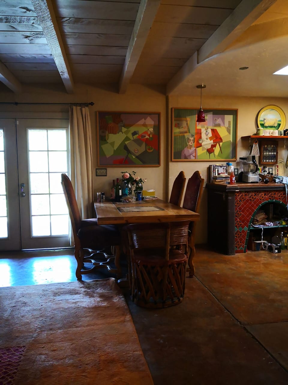 Dining room table seats 8.  One table for 10 and another for 6 on porch.