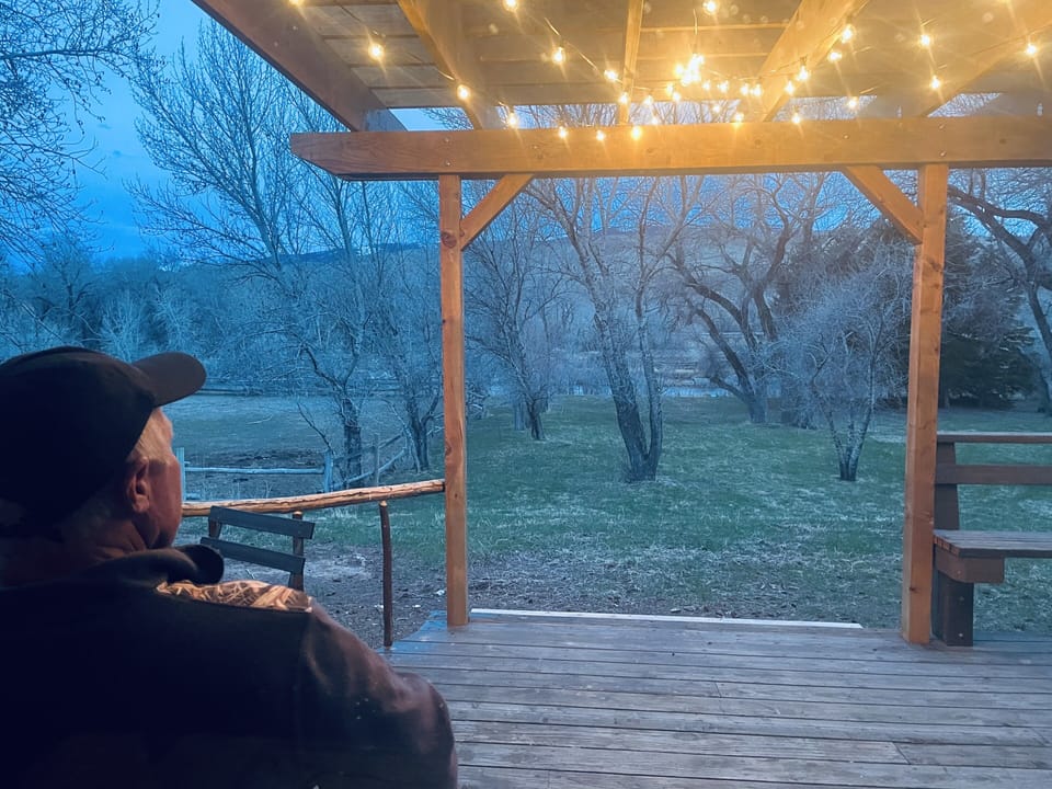 Sitting on the deck, enjoying the twilight over the Wind River
