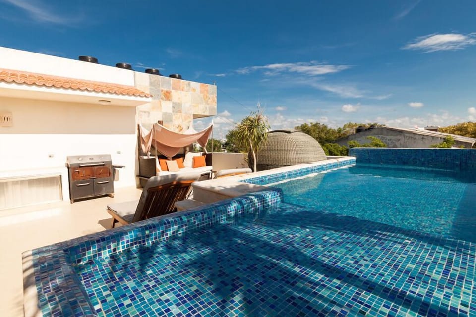 Common Roof top garden, with pool, BBQ, Lounge area, Caribean Palapa.