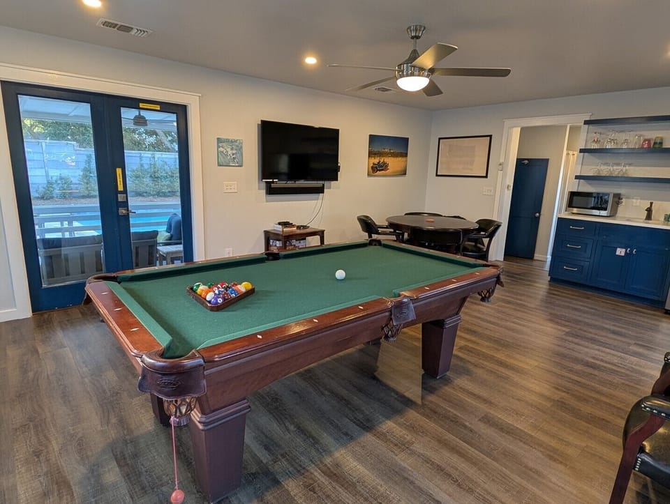 Game Room Opens to the Screened Porch and Pool 