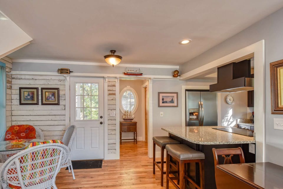 Large counter height bar is a great space to snack or serve.
