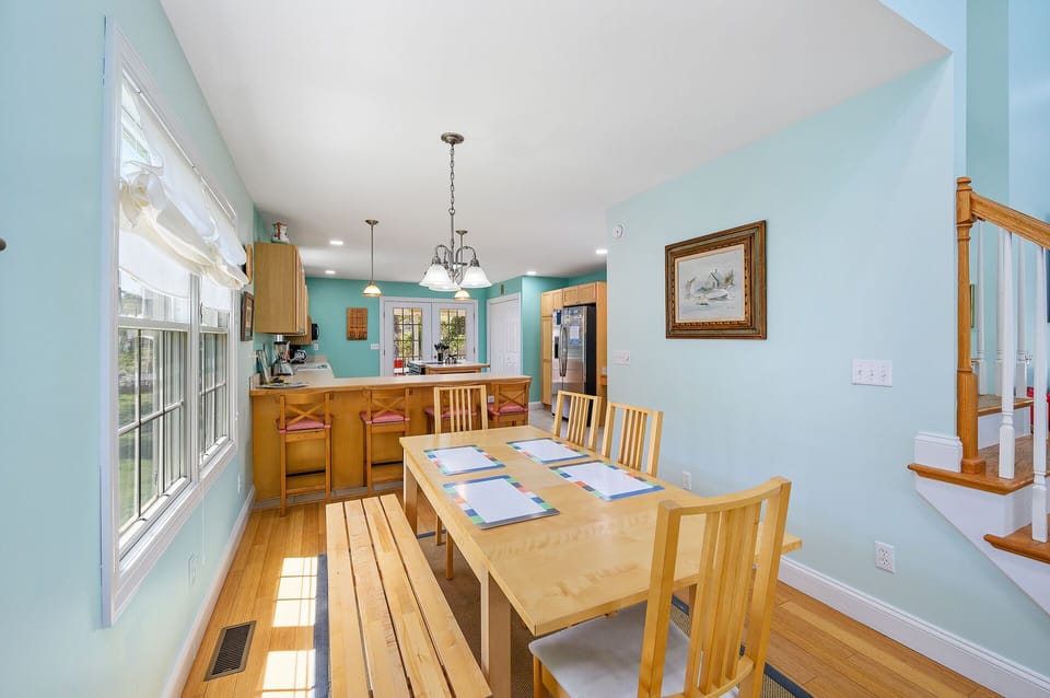 Billowy, Beachy white shades add to the Coastal Feel of this awesome Home.