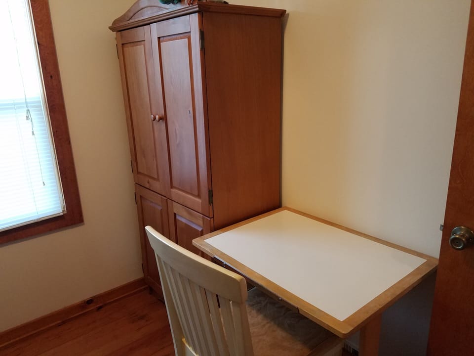 The second bedroom also offers a desk if the others are occupied.