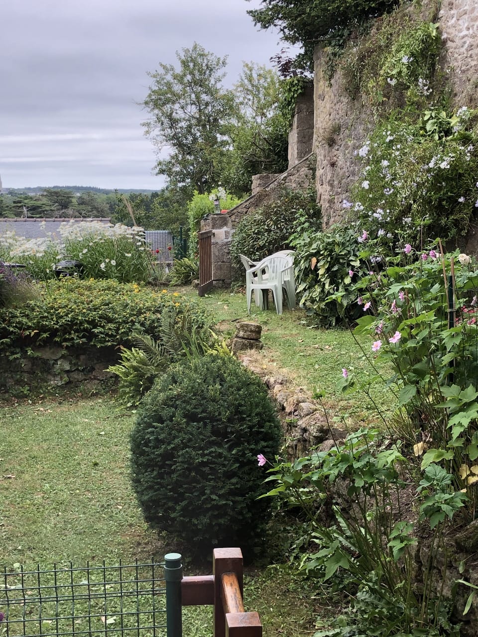 Walled private garden, part of 13th century Chateau Auray area. 