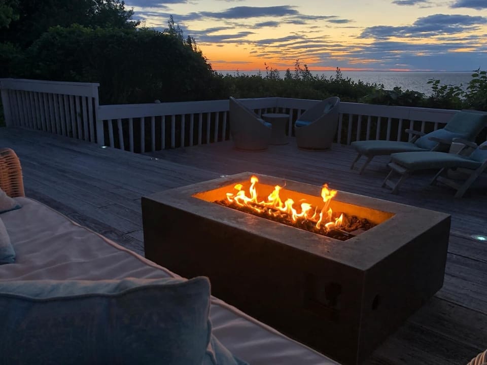 Gas fire table on the main deck at sunset