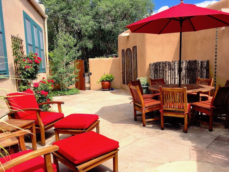 A gas grill and seating for 10.