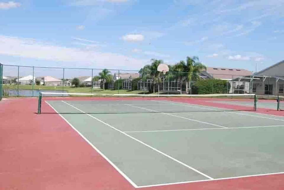 The neighborhood has two lit tennis courts!