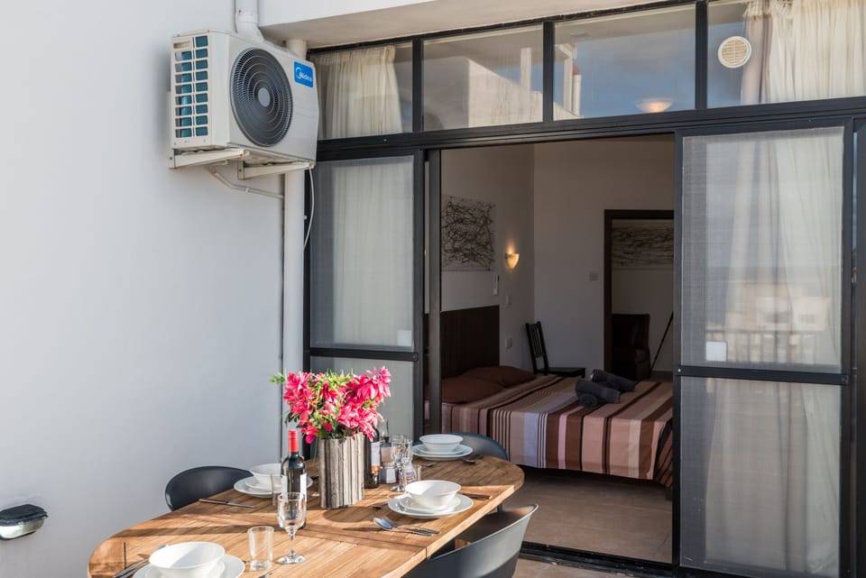 Terrace Equipped With Outdoor Furniture and Gas BBQ.