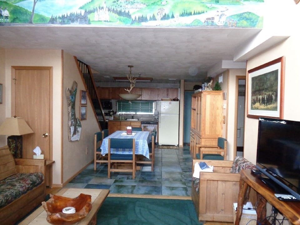 Partial view of dining area and some of the kitchen area
