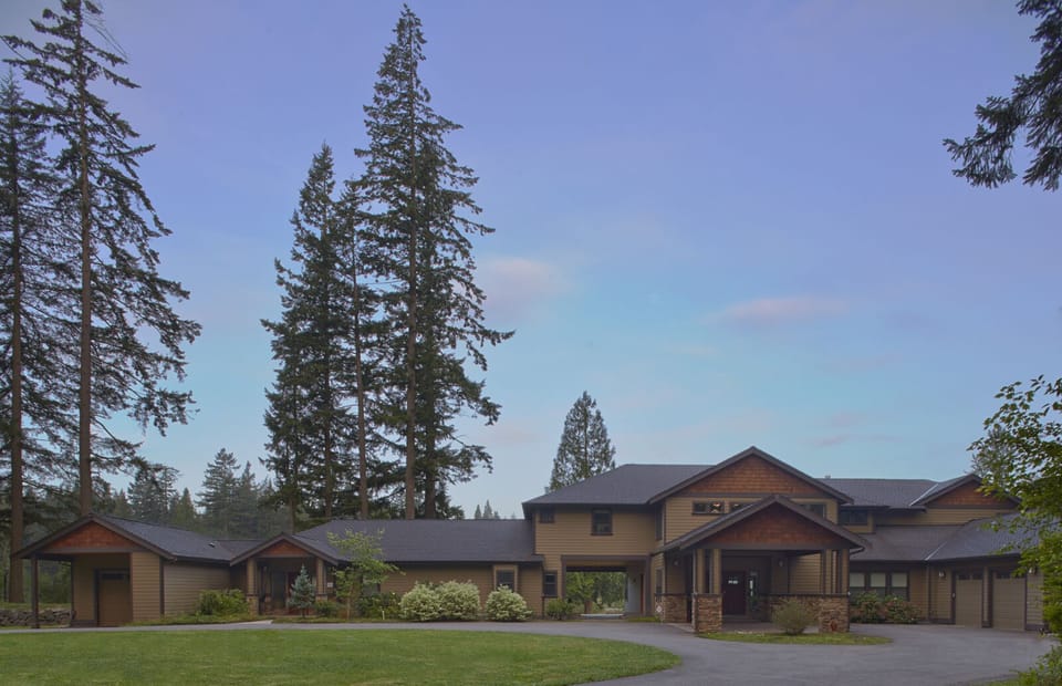 Front driveway entrance.  The small apartment to left is not included.